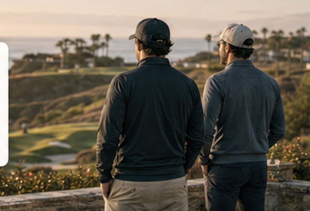 Golf travel professionals overlooking a coastal golf course